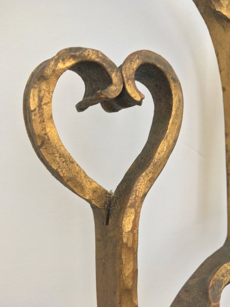 Image of Decorative Headboard with Heart-Shaped Details