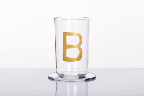 Image of VERBA water glass with Latin letter in gold