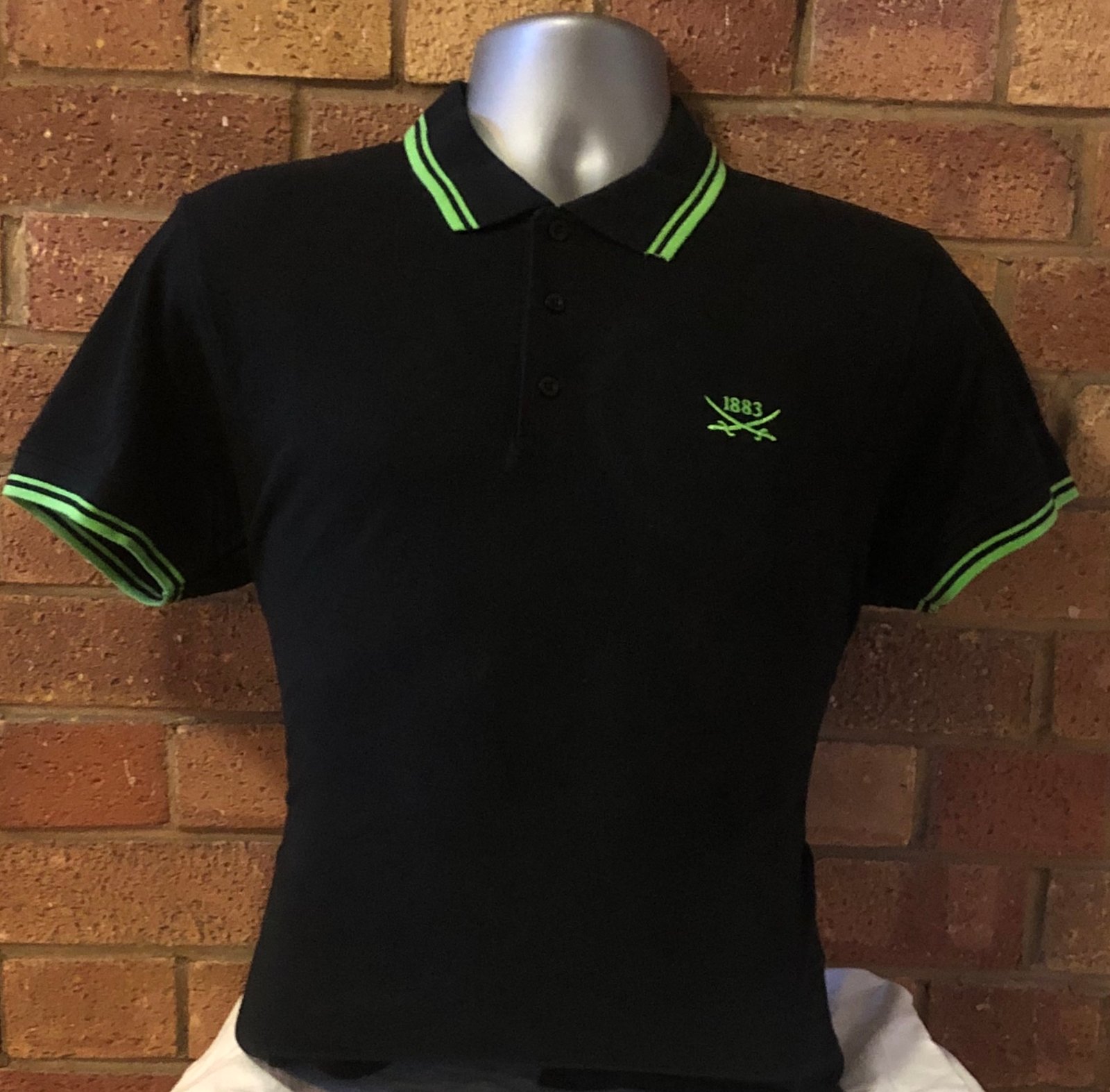 black and neon green polo shirt