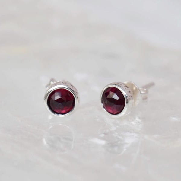 Image of Red Garnet rose cut silver stud earrings