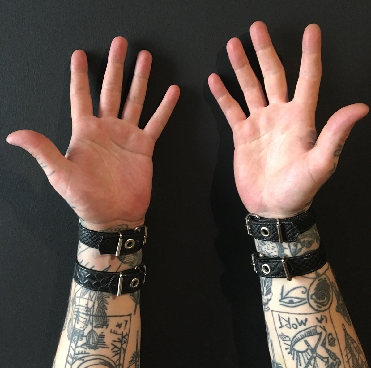 Double strap cuff silver pair