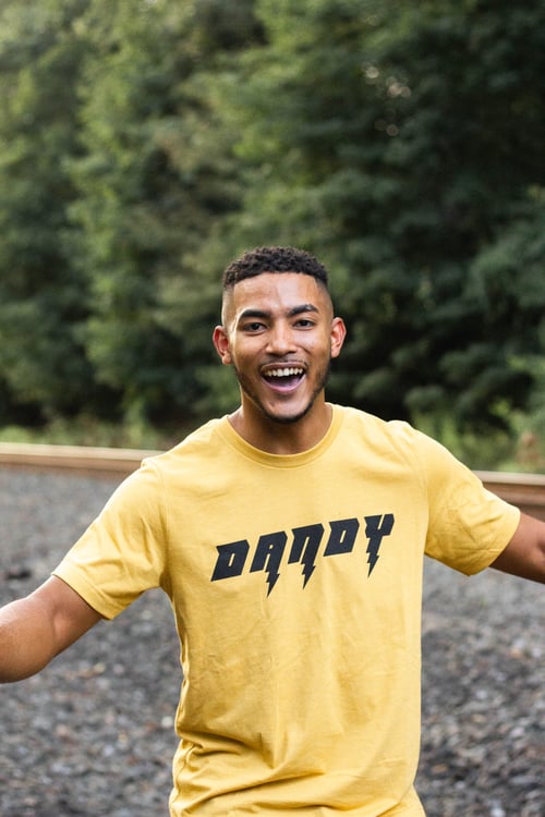 Image of Mustard Black Lightning DANDY Unisex Tee