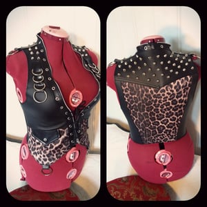 Image of Fauxleather leopard vest with rings and studs