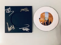 Signed "The Verse" black sleeve with record groove effect white CD