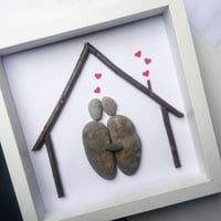 Image 2 of couple under a house artwork