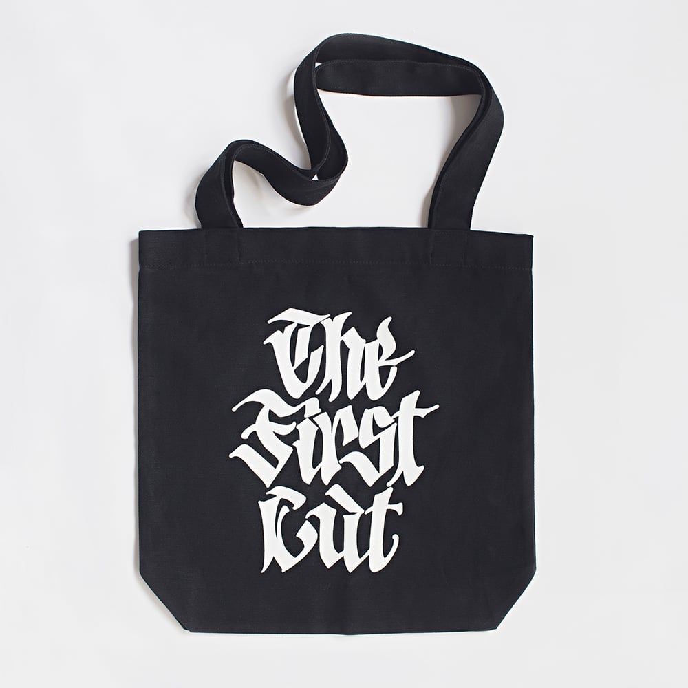 Image of 'THE FIRST CUT' tote bag