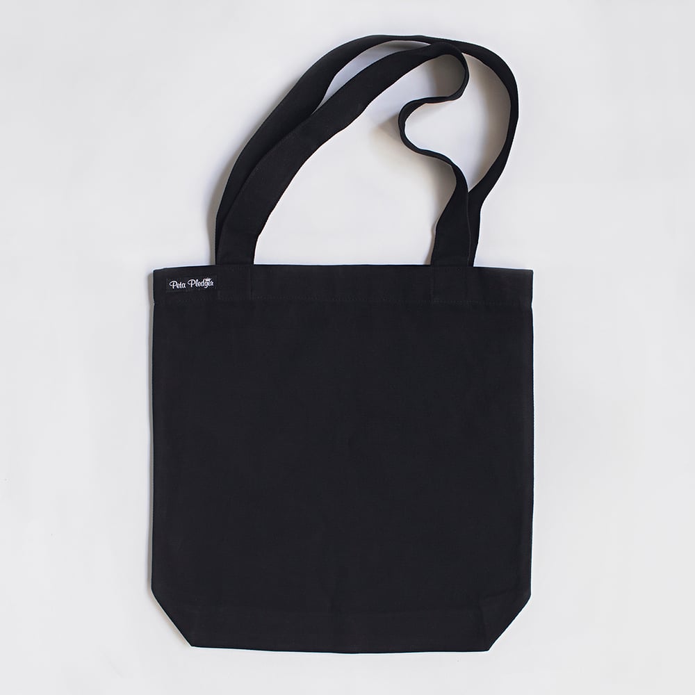 Image of 'THE FIRST CUT' tote bag