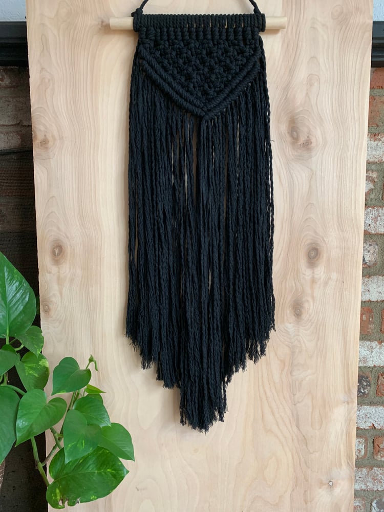 Black macrame wall hanging