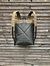 Image 4 of Vegan backpack in black Piñatex™ and field tan waxed canvas with roll to close top