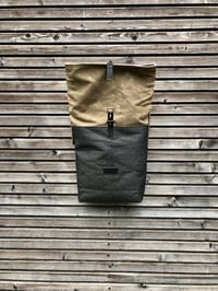 Image 3 of Vegan backpack in black Piñatex™ and field tan waxed canvas with roll to close top