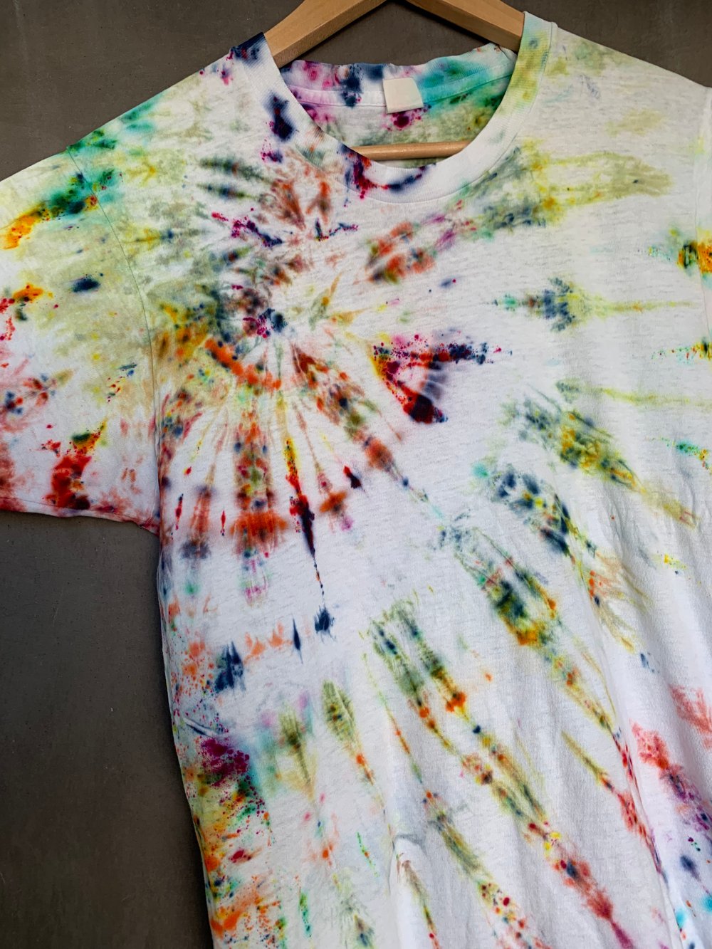 Image of rainbow spiral tie dye on vintage tee - small