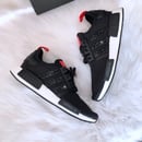 Image of Swarovski Adidas NMD R1 Black customized with Swarovski Crystals.