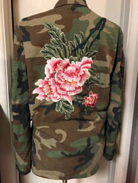 Image 1 of Camo jacket featuring custom stitched peony