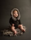 Adorable Eskimo sitter rompers.  Preorder 