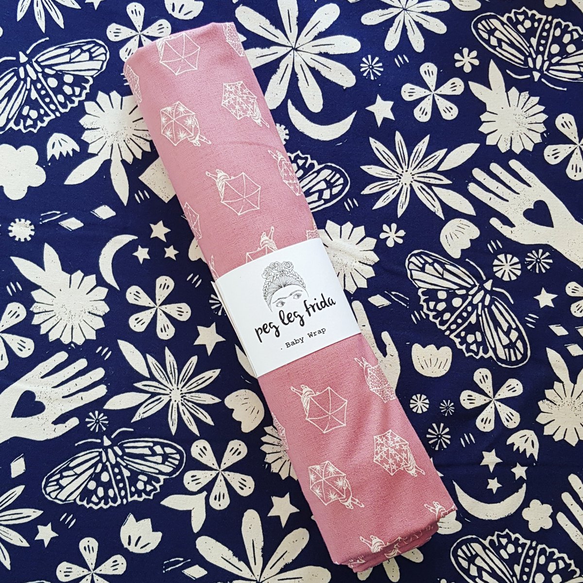 Image of Woven Baby Wrap - Umbrellas