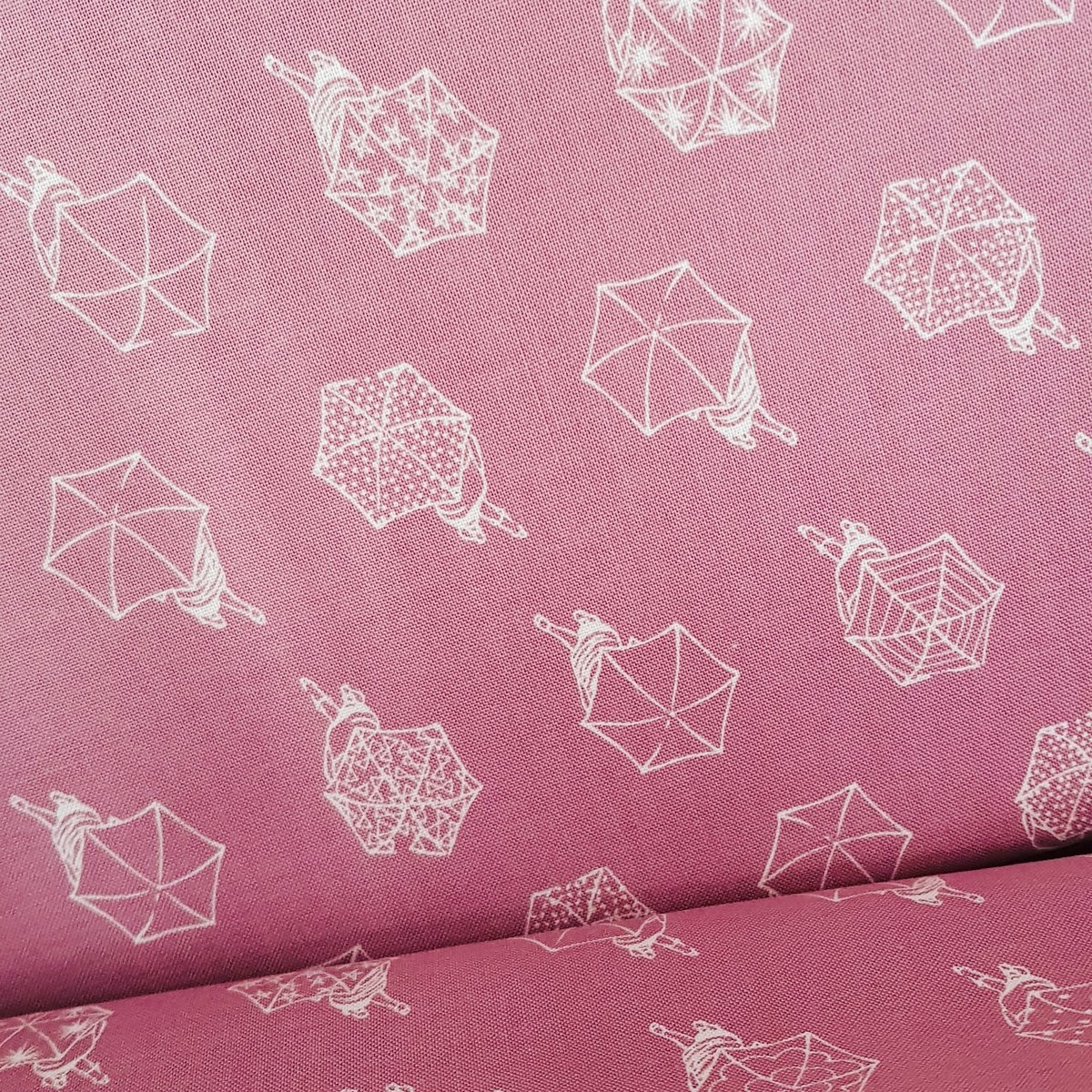 Image of Woven Baby Wrap - Umbrellas