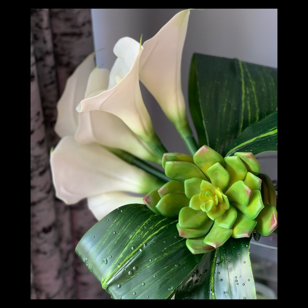 Image of Lilies in a bow