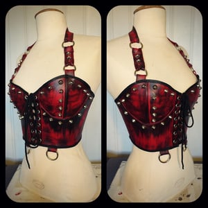 Image of Studded red fauxleather top with rings