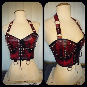 Image of Studded red fauxleather top with rings
