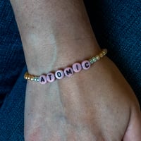 Image 2 of ‘Atomic’ peach pink freshwater pearl bracelet 