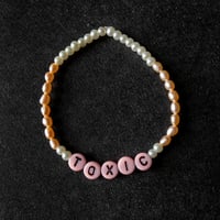 Image 1 of ‘Toxic’ peach pink freshwater pearl bracelet 