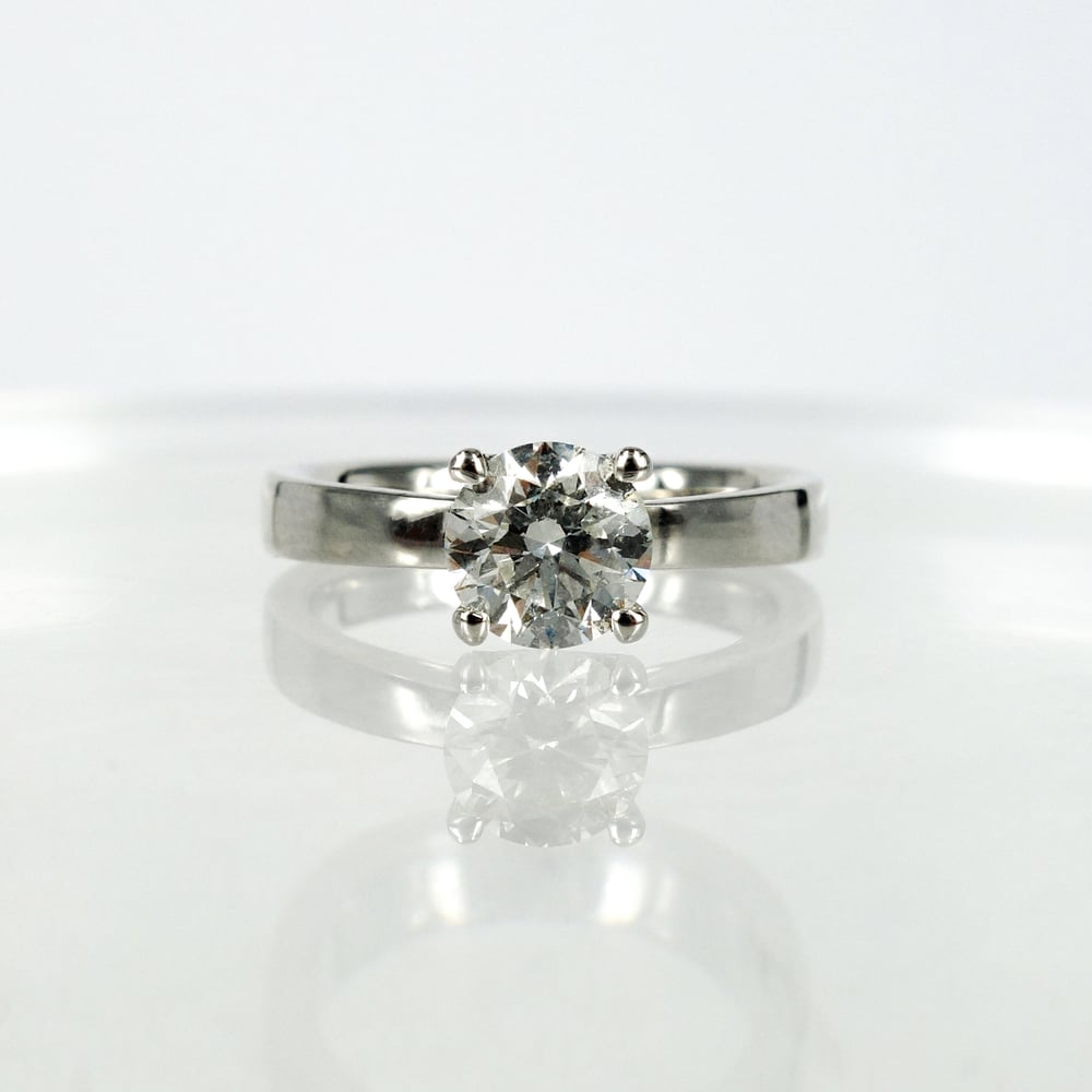 Image of 18ct white gold four claw diamond solitaire engagement ring. pj5545