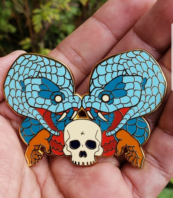 Image of Coatlicue enamel pin 