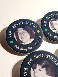 Image 2 of 12 Black Retro Hunger Strikers button badge set. 