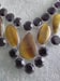 Image of TIGERS EYE W/BLACK SPINELL