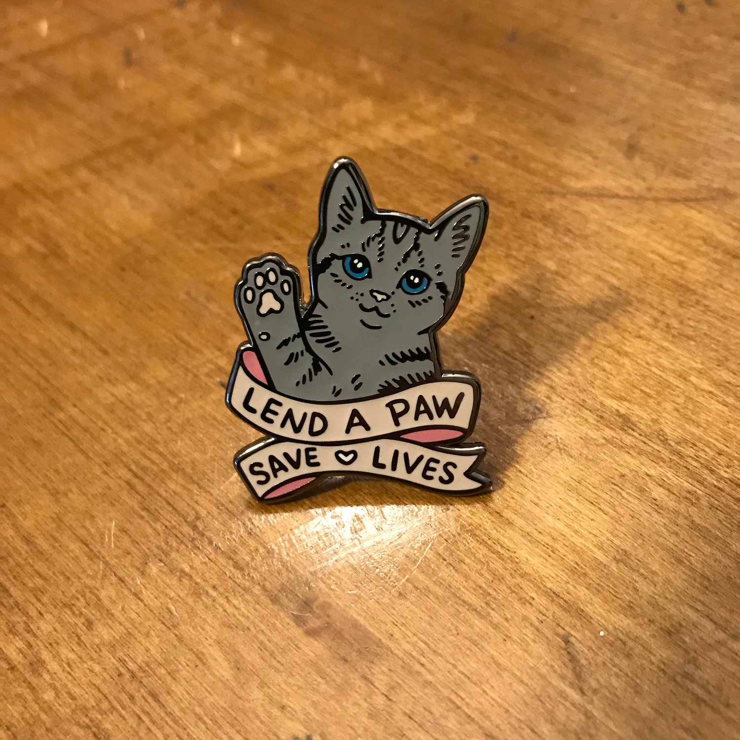 Image of Lend A Paw Enamel Pin