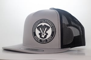 Image of Hoggshit black and silver offset trucker cap
