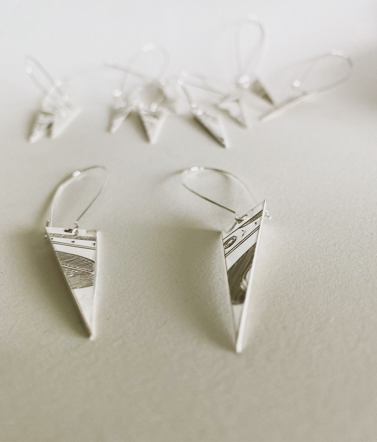 Image of Silver arrow tip earrings