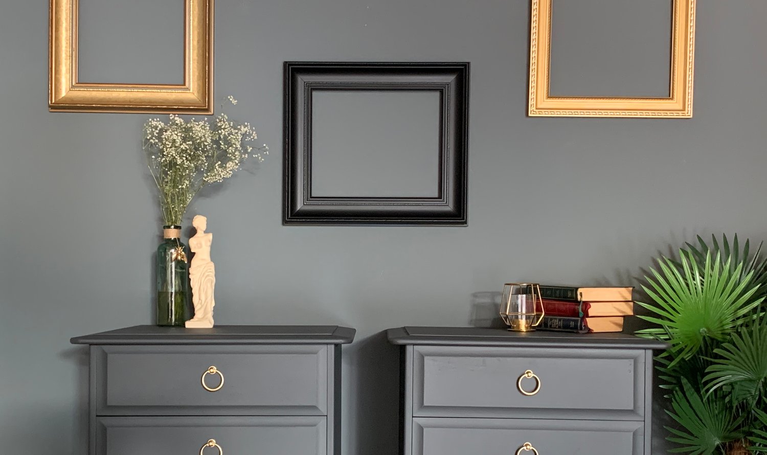 Image of A pair of dark grey stag mahogany bedside tables 