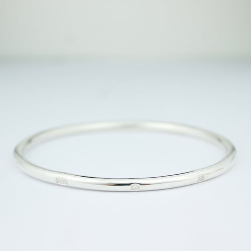 Image of Chunky round sterling silver feature hallmark bangle