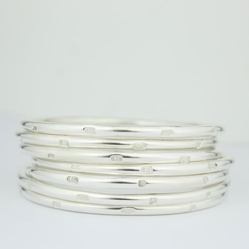 Image of Chunky round sterling silver feature hallmark bangle