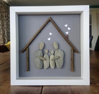 Image 1 of Family of four under house artwork