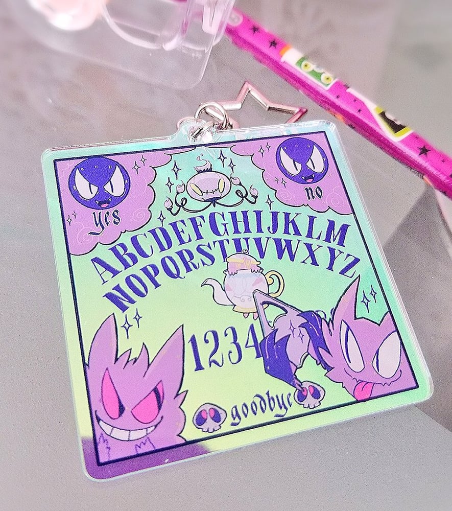 Image of RAINBOW HOLO POKE OUIJA KEYCHAIN
