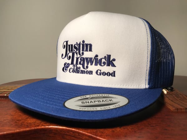 Image of Justin Trawick and The Common Good Embroidered Trucker Cap (Blue)