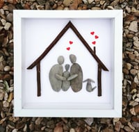 family of 3 with dog under house artwork