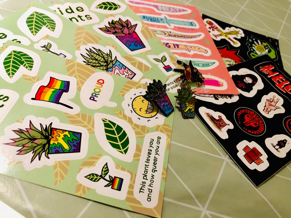 Image of Enamel pins and Sticker sheets