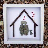 Image 1 of Couple and baby with dog underneath house