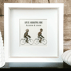 Couple on bikes artwork