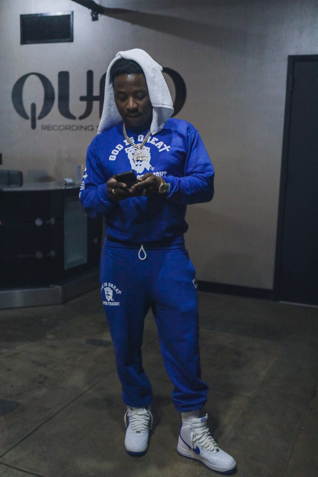 blue sweatsuit