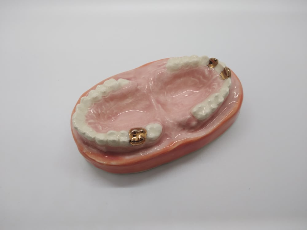 Image of Teeth Dish with Gold Teeth