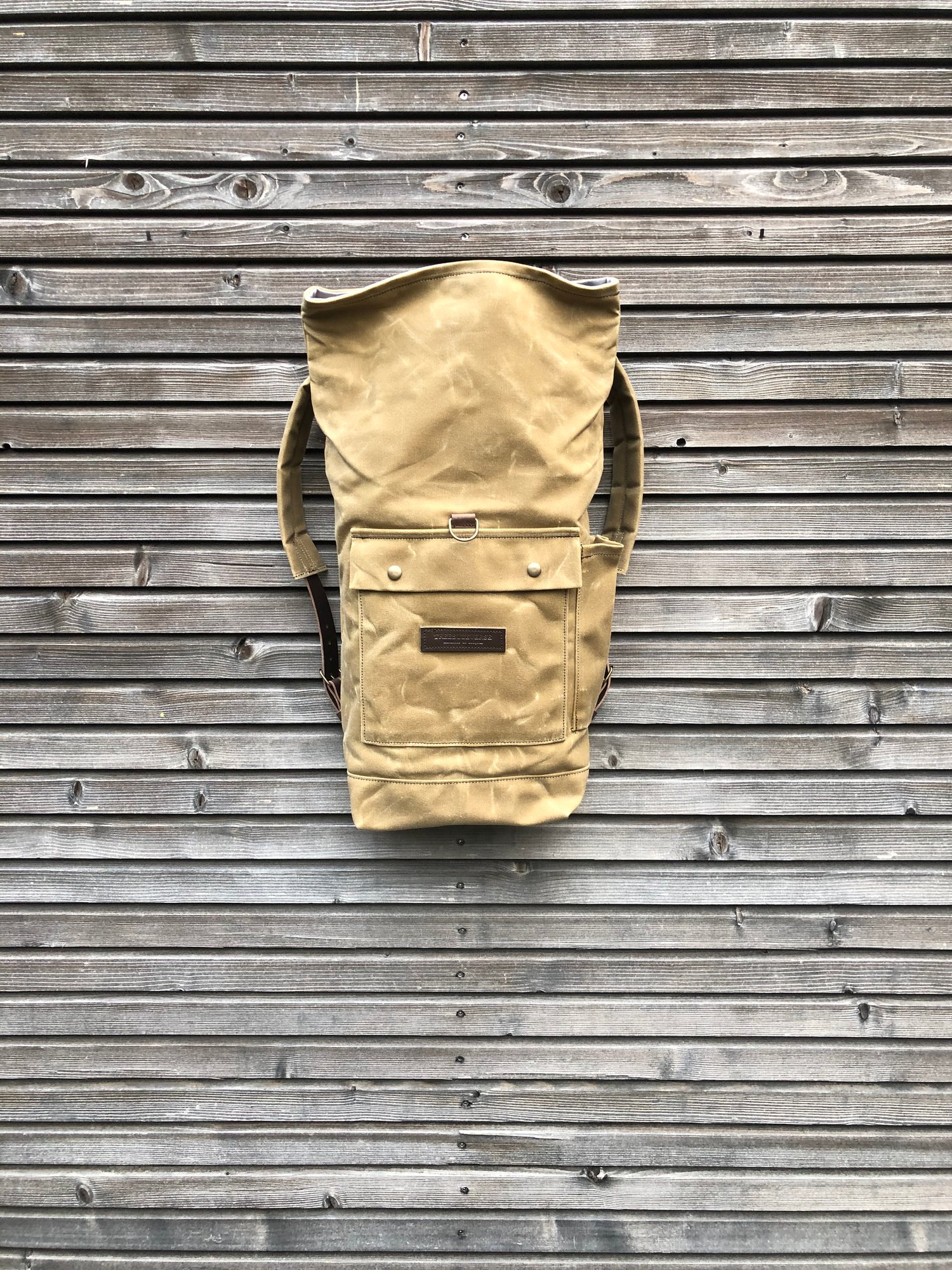 Image of waxed canvas backpack / waterproof backpack with padded shoulder straps