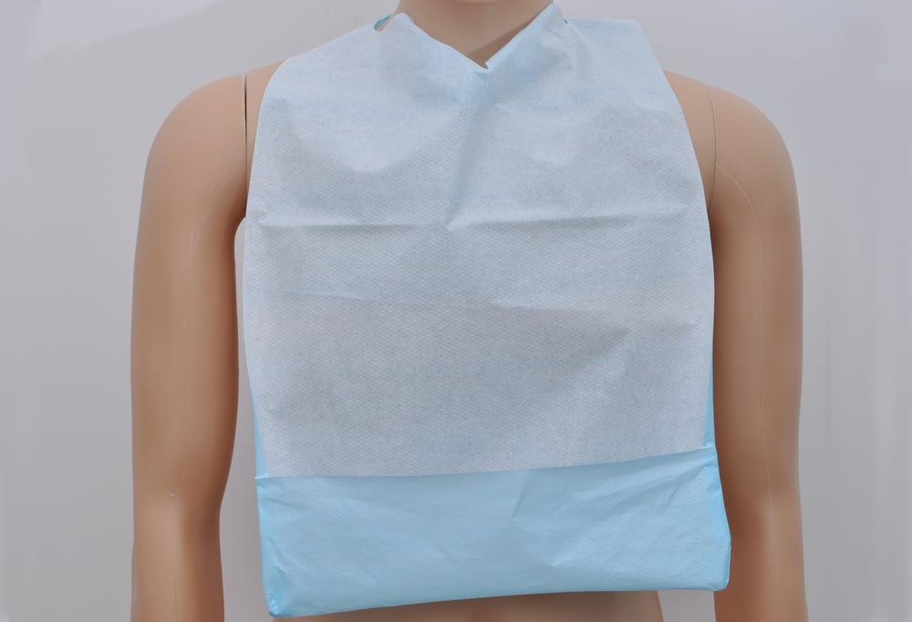 Image of Disposable Bibs For Adults, Bib Rolls For Dental Clinic, Adult Bib Manufacturer & Supplier - Care-De