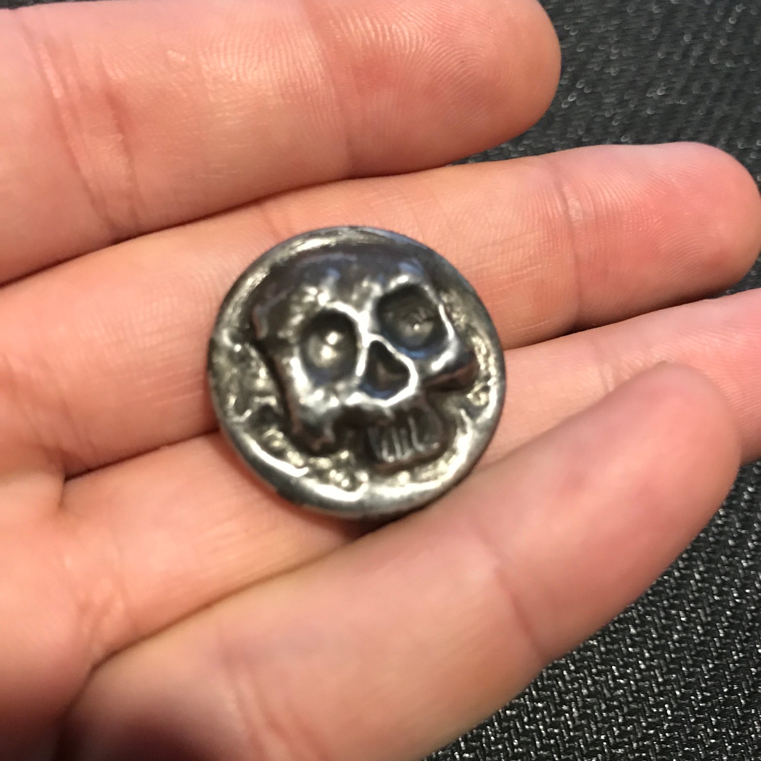 Image of Repousse skull button