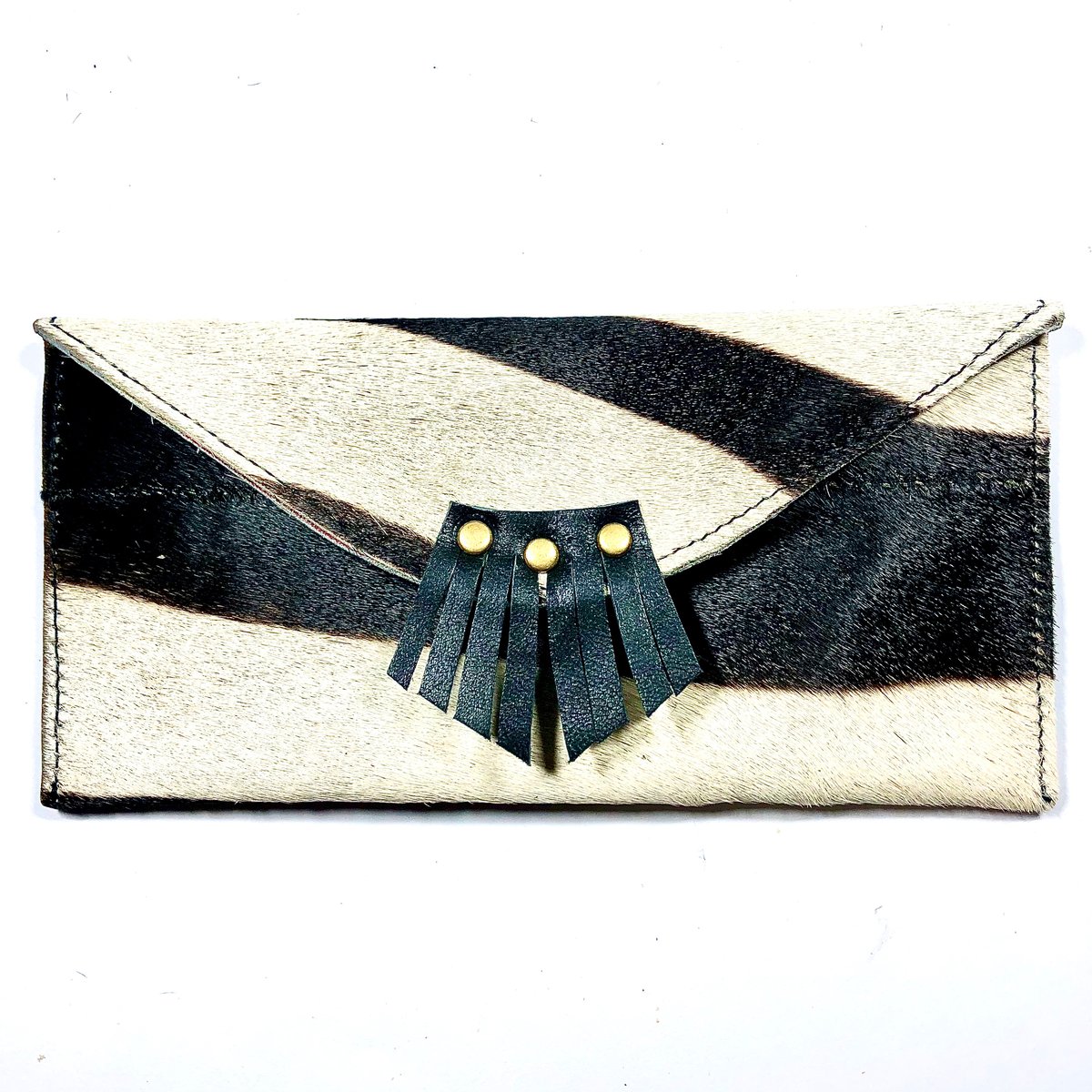 Image of Sunglasses case in zebra fur with fringe