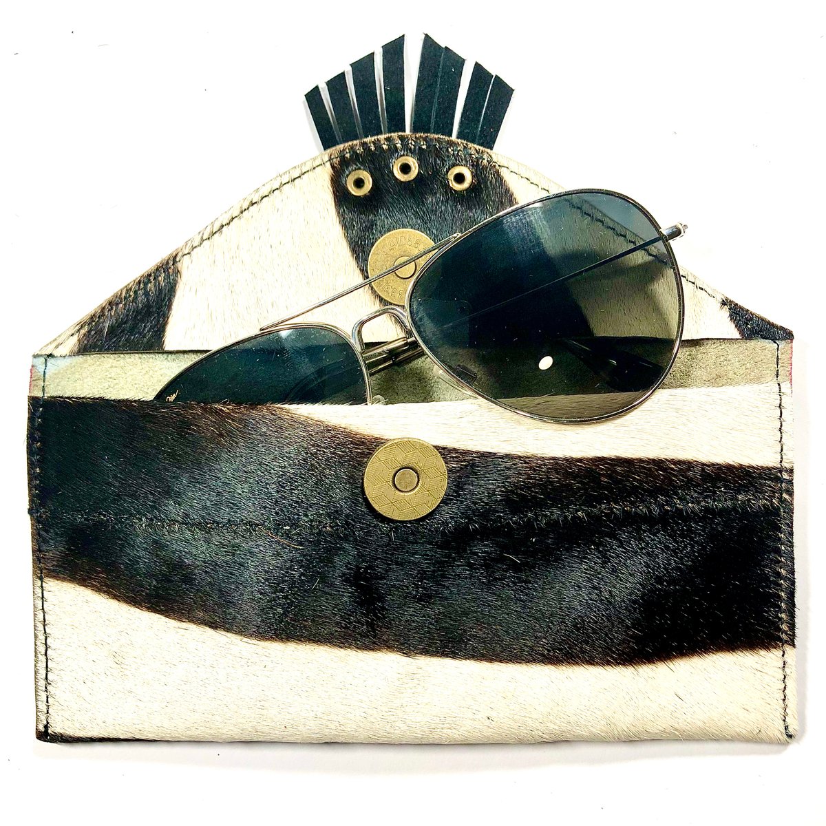 Image of Sunglasses case in zebra fur with fringe