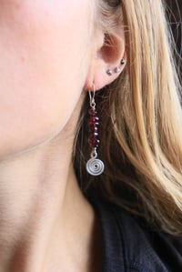 Image 1 of Silver x Spiral Garnet Earrings